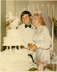 Bill and Kathy cut the cake